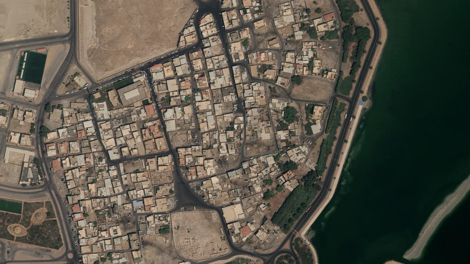 High-resolution satellite imagery of the old town of Darin on Tarout Island, Saudi Arabia, at 30 cm from Beijing-3N: individual cars, houses, palm trees and the corniche road are all resolved